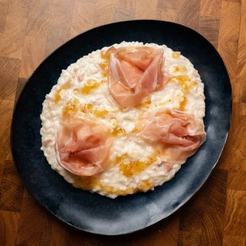 Risotto con Prosciutto di San Daniele, stracciatella e fichi